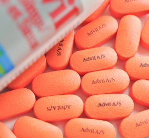 orange tablets labelled with 'Advil A/S'