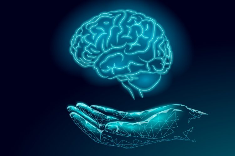 Alzheimer's treatment - glowing human brain about a hand