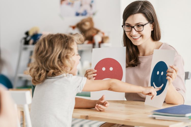 autistic child receiving therapy from psychiatrist