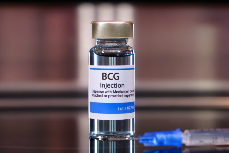 Vial labelled 'BCG Injection' next to a syringe - idea of BCG vaccine