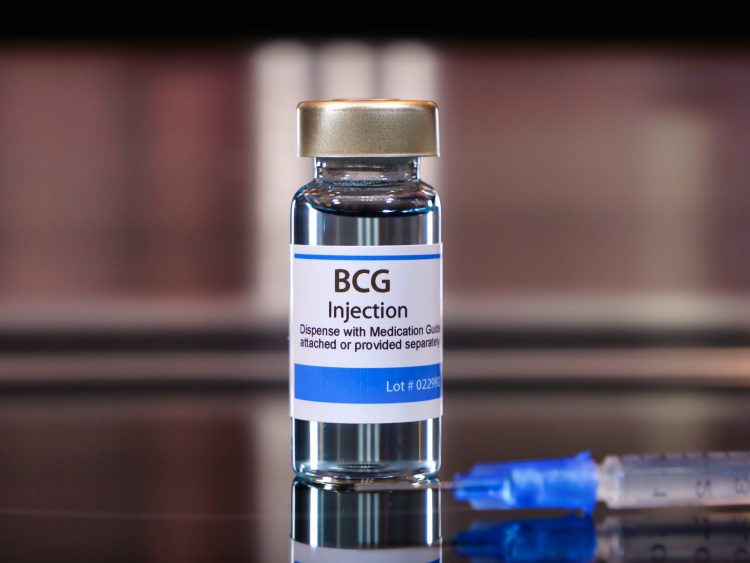 Vial labelled 'BCG Injection' next to a syringe - idea of BCG vaccine