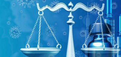 Idea of pharmaceutical regulation or legislation - scales of justice in front of virus particles and vaccine vials/syringes