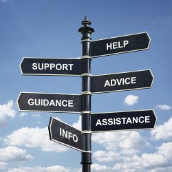 Signpost labelled with words like 'help', 'support', 'advice', 'guidance' - regulators are able to support companies in this way