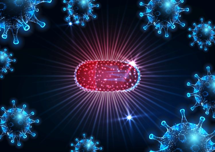 Futuristic antiviral medication against SARS-CoV-2 viral disease covid-19 with glowing low polygonal cred capsule pill and virus cells on dark blue background.