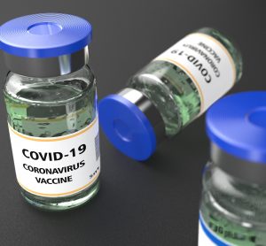 Vials labelled 'COVID-19 CORONAVIRUS VACCINE'
