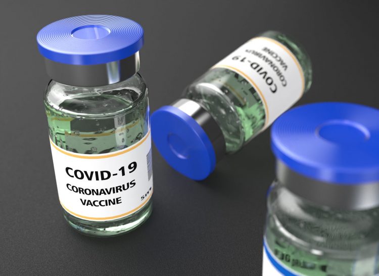 Vials labelled 'COVID-19 CORONAVIRUS VACCINE'