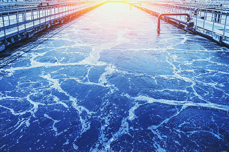 Swirling water in a wastewater treatment tank - idea of wastewater-based epidemiology (WBE)