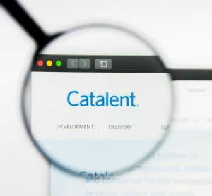 Catalent logo on website through a magnifying glass [Credit: Pavel Kapysh/Shutterstock.com].