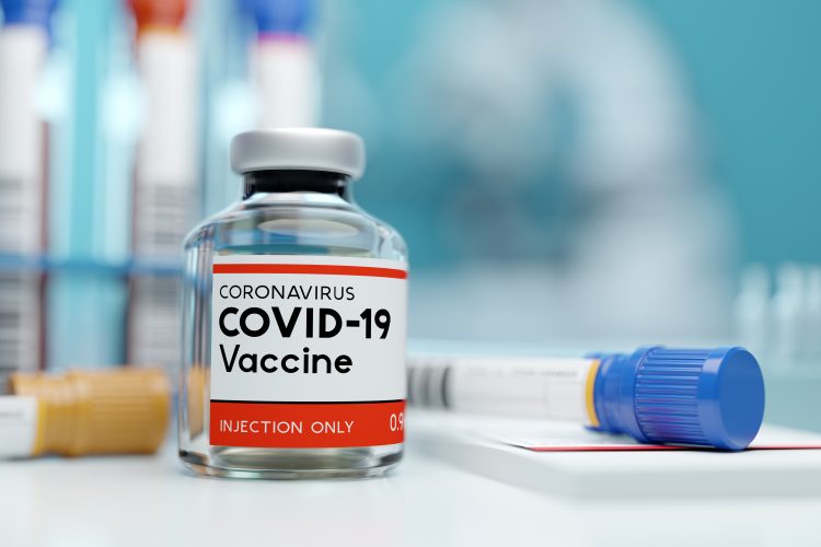vial labelled 'COVID-19 Vaccine'
