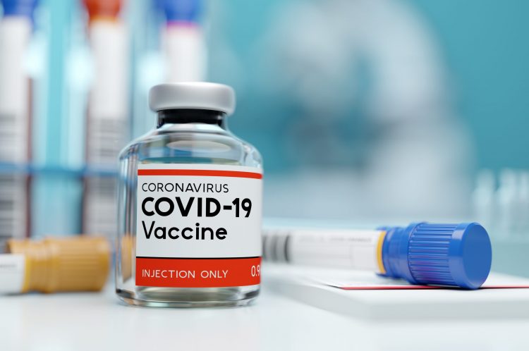 vial labelled 'COVID-19 Vaccine'