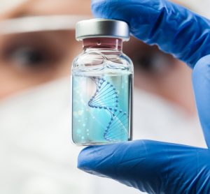Doctor holding up a vaccine vial with a DNA strand in it - idea of DNA vaccine