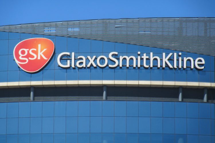 The GlaxoSmithKline headquarters building in Brentford, west London, June 2018 [Credit: Willy Barton / Shutterstock.com].