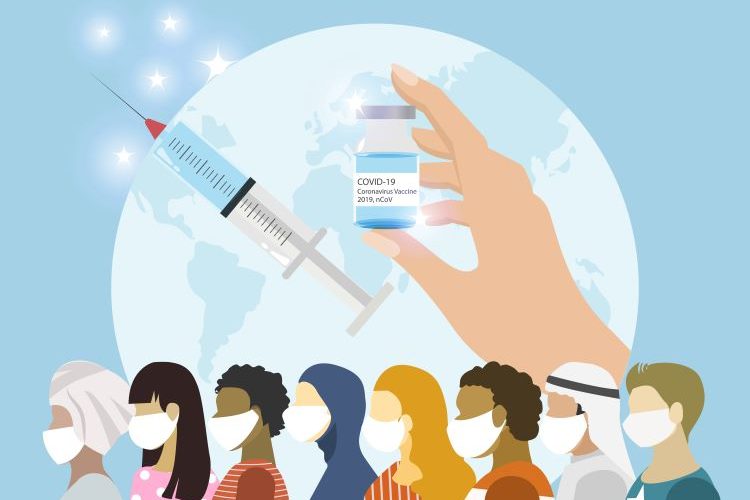 Cartoon of a globe with various races of people wearing facemasks and a vial labelled 'COVID-19 VACCINE' in front of it