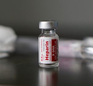 Vial labelled heparin. [Credit: SamaraHeisz5 / Shutterstock.com].