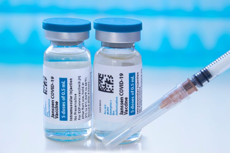 Two vials labelled 'Janssen COVID-19 Vaccine' [Credit: oasisamuel/Shutterstock.com].