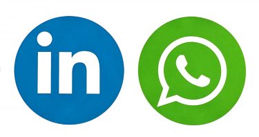 The social media symbols for LinkedIn and WhatsApp
