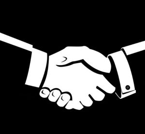 Black and white illustration of shaking hands - idea of mergers and acquistions