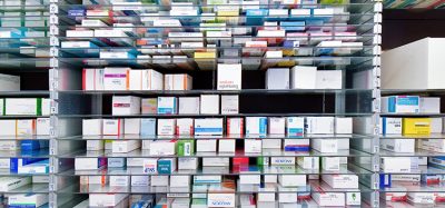 shelves of boxes containing pharmaceuticals - idea of pharmaceutical packaging
