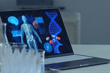 Precision medicine or gene therapy development concept - computer on lab bench with screen showing a human body, DNA strand and pharmaceutical pills