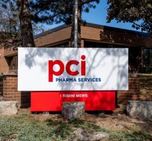 PCI Pharma Services logo on sign outside Canadian facility [Credit: JHVEPhoto/Shutterstock.com].