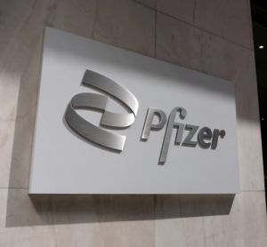 Pfizer logo on a sign in New York city, US [Credit: Molly Woodward / Shutterstock.com]