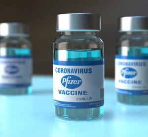 Vials labelled 'COVID-19 Vaccine Pfizer' [Giovanni Cancemi / Shutterstock.com].