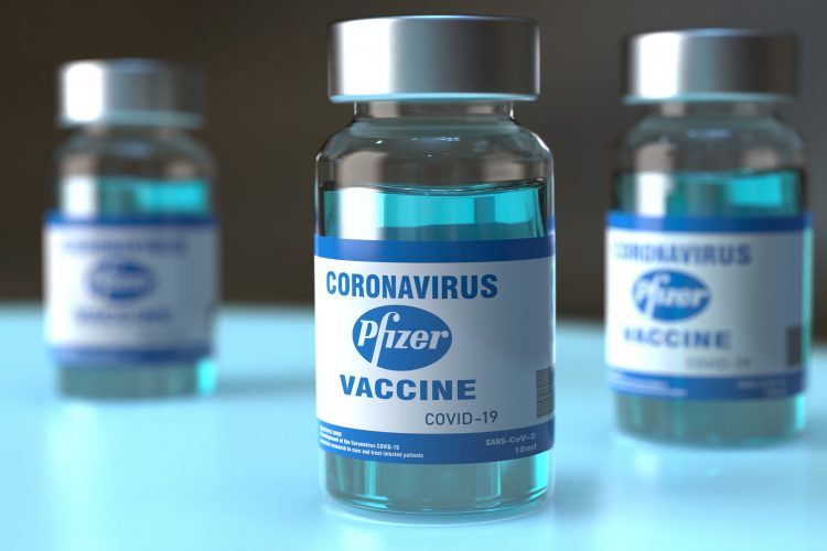 Vials labelled 'COVID-19 Vaccine Pfizer' [Giovanni Cancemi / Shutterstock.com].