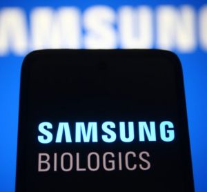 Samsung Biologics logo on a phone screen [Credit: viewimage/Shutterstock.com].