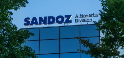 Sandoz company logo on office building in Warsaw city centre [Credit: Konektus Photo/Shutterstock.com].