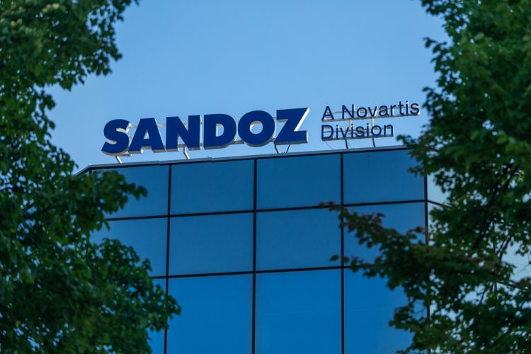 Sandoz company logo on office building in Warsaw city centre [Credit: Konektus Photo/Shutterstock.com].