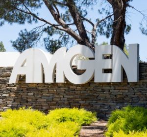 Close up of Amgen sign at its headquarters in Thousand Oaks, California, USA [Credit: JHVEPhoto/Shutterstock.com].