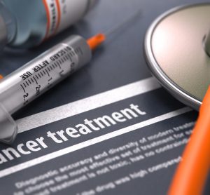 paper titled cancer treatment surrounded by medication