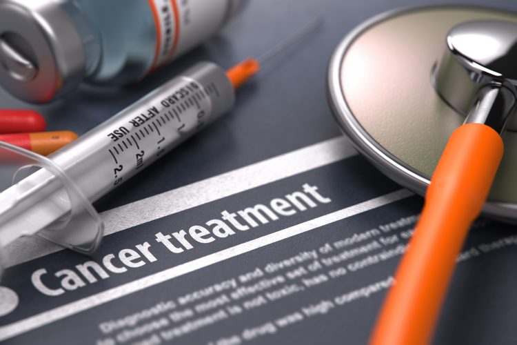 paper titled cancer treatment surrounded by medication