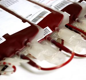 Human blood in bags in storage - concept of blood transfusion