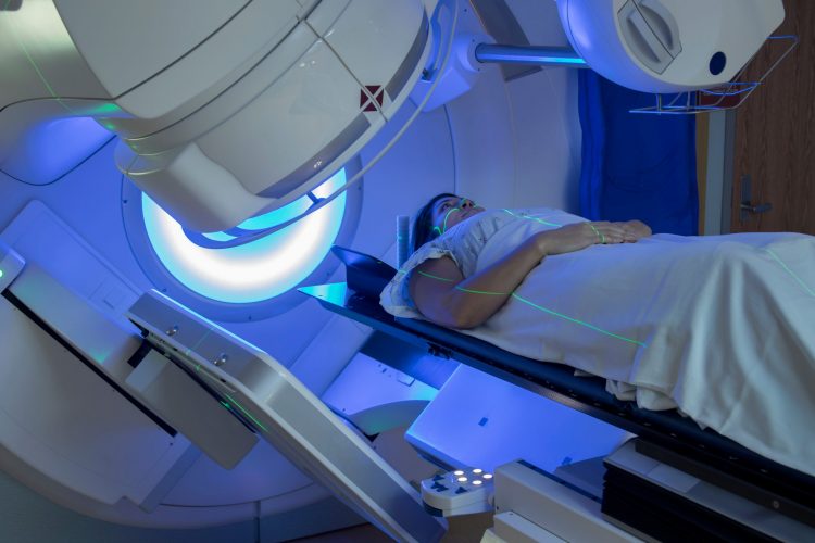 woman receiving external beam radiotherapy