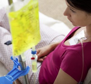 woman recieving chemotherapy through central port