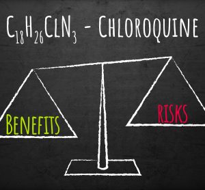 drawing of a scales balancing 'risks' and 'benefits' under the word 'CHLOROQUINE' on a black board