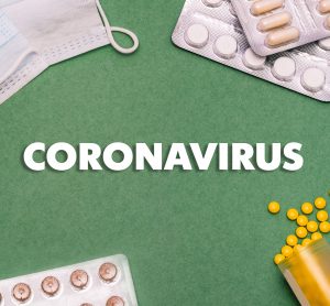 the word 'coronavirus' surrounded by tablets and a face mask