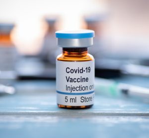 vial labelled 'COVID-19 vaccine'