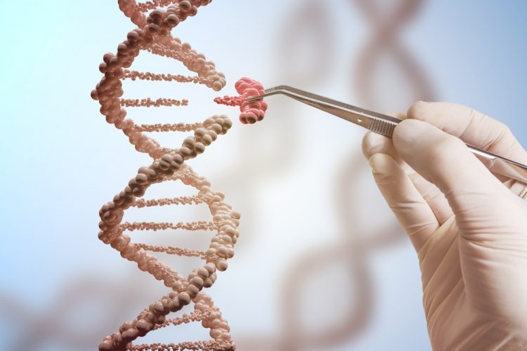 Gene therapy concept - hand using tweezers to insert a new DNA segment into a larger DNA strand