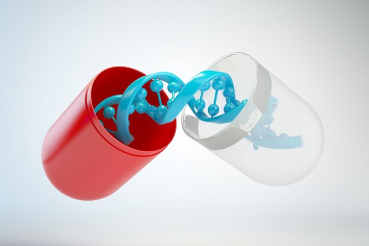 DNA inside a red and white capsule - gene therapy concept