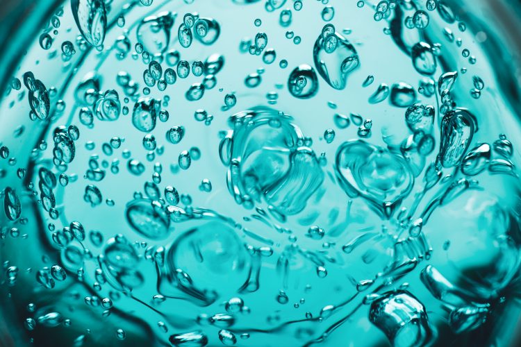 teal coloured hydrogel with bubbles in it