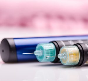 close up image of pre-loaded injection pens like those used to self-administer insulin and other medications