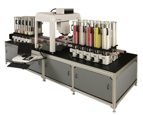 Figure 2: SciClone™ (Caliper LifeSciences) liquid handler interfaced to three stacker and rail systems. This system is optimized for performing plate to plate transfers for High Throughput Screening. One rail with 2 stackers provide source plates in a 384 well format while two additional rails with 10 stackers each provide destination plates. The system is configured with one 384 well pipetting head and an 8 tip flexible dispenser.