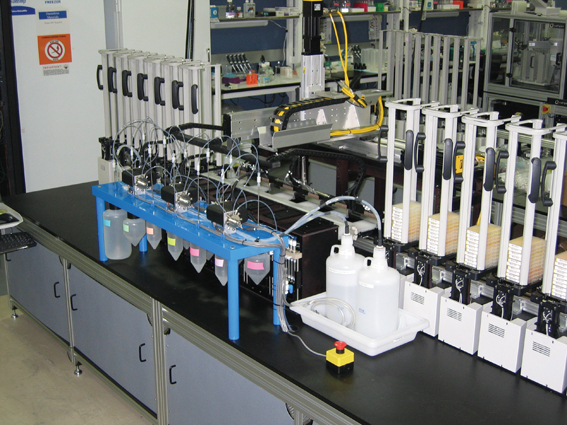 Figure 3: LiquidZilla (Amphora Discovery) automated dispensing system. This system has a single rail with 12 stackers and can add 6 reagents independently to each of 6 - 384 well micro-plates.