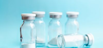 lyophilised drug cake in glass vials - white powder in glass vaccine vials