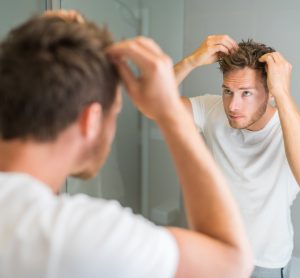 Man checking hair