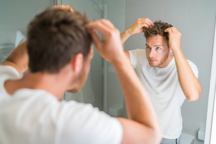 Man checking hair