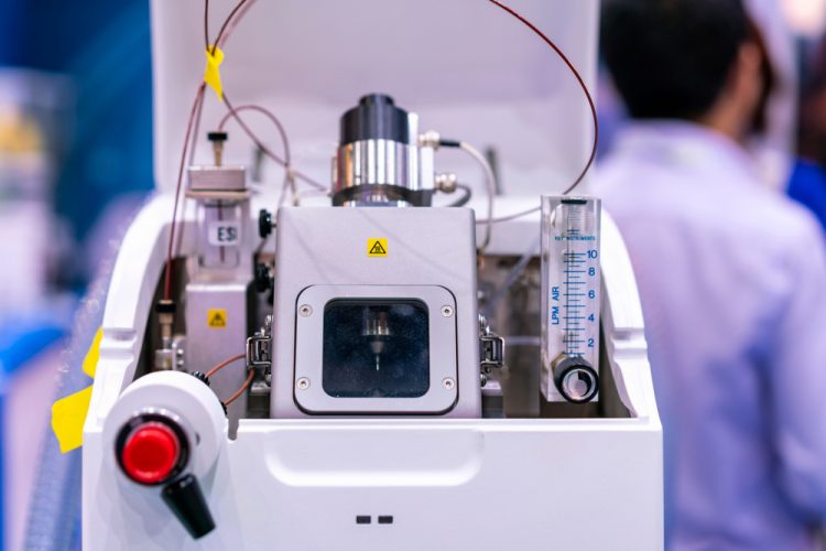 close up of a mass spectrometer device with blurred lab background - idea of mass spectrometry