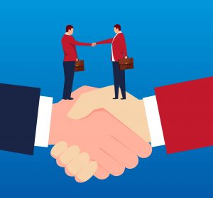 mergers and acquisitions concept - graphic of two business people shaking hands